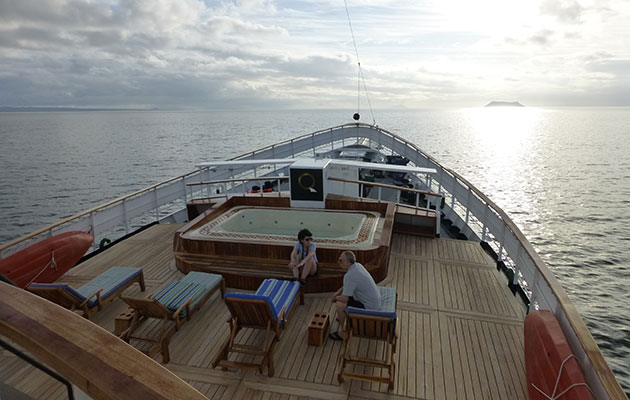 ship sunset galapagos