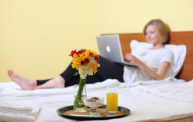 woman in hotel with breakfast